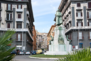 Umberto I statue against the Via Raffaele de Cesare, Naples, Italy