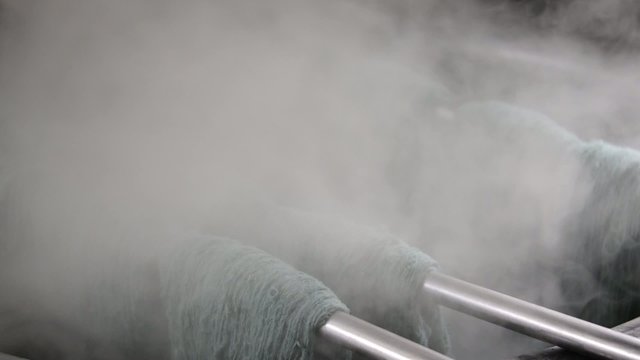Wool dyeing in a carpet factory, Nepal