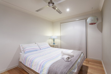 Bedroom with wooden floors