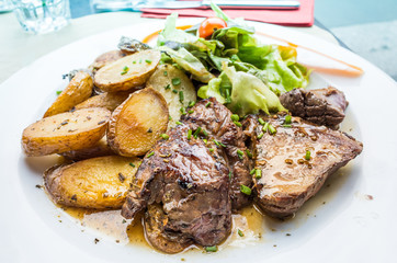steak beef meat with tomato and potatoes