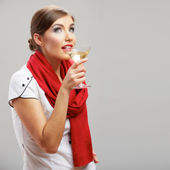 Beautiful smiling woman with wine glass .
