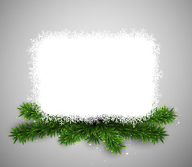 White paper card over christmas eve branches.