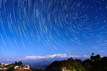 Fotobehang Star trails over Bandipur, Nepal © Thomas Dutour