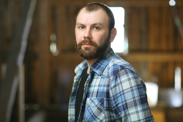 portrait of a bearded man in a rustic style