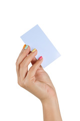 female hand with manicure holding a business card