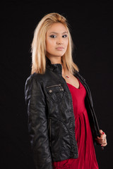 Fototapeta premium Blond woman looking thoughtfully at the camera