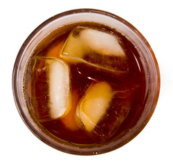 glass with ice tea full with ice cubes on white background