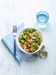 chicken salad with tomatoes and dried grapes