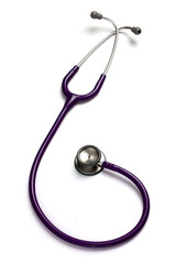 Old purple stethoscope on isolated