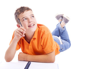 Pensive school kid looking up, isolated over white background © cristovao31