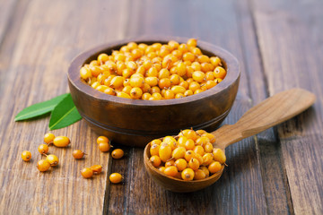 Sea buckthorn on a wooden
