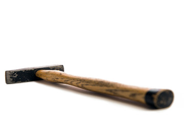Pin hammer lying on white surface
