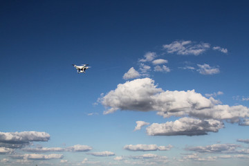 Fototapeta na wymiar Drone - UAV - flying in the sky
