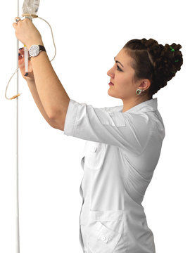 Nurse with a dropper and basin