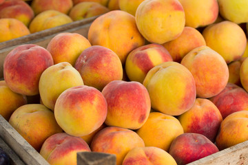 Fototapeta na wymiar Organic peaches at the market