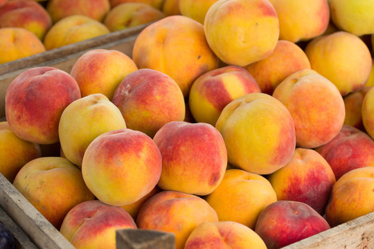 Organic peaches at the market