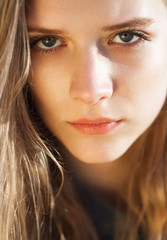 Young beautiful girl close up portrait