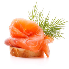 sandwich or canape with salmon on white background  cutout