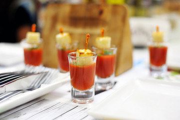 Caucasian sauce adjika with croutons in a glass