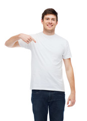 smiling young man in blank white t-shirt