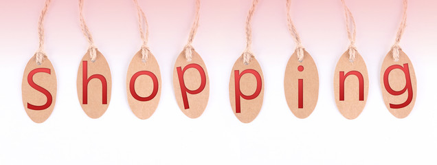 Shopping tags on color background