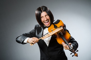 Man violin player in musican concept