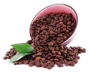 Coffee beans in big lilac bowl isolated on white