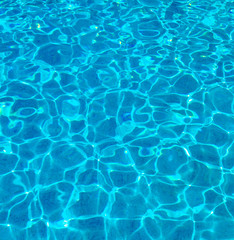 Blue ripped water in swimming pool