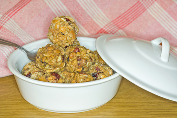 Cup full of nuts raisin and oat balls