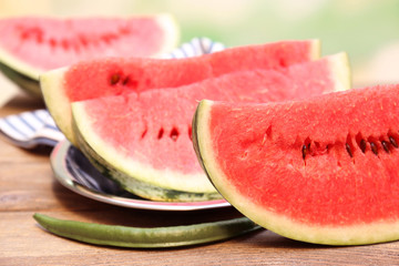 Fresh slice of watermelon on table outdoors, close up