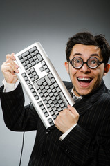 Comouter geek with computer keyboard