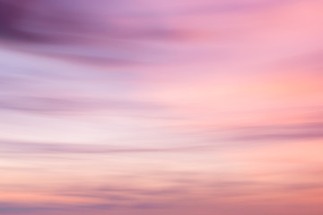 Defocused sunset sky background  with blurred panning motion.