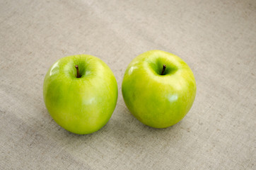 Еwo green Apple background