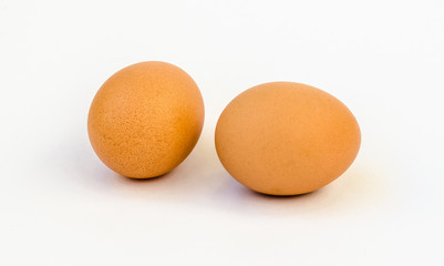 Two eggs isolated in white background.