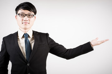 Successful young business man of Asian, full length portrait iso
