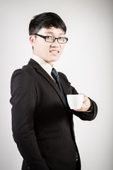 Successful young business man of Asian, full length portrait iso