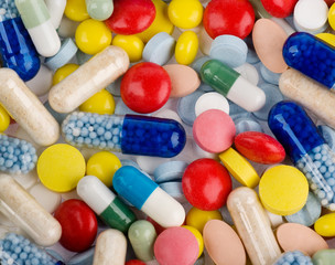 Color pills and capsules background