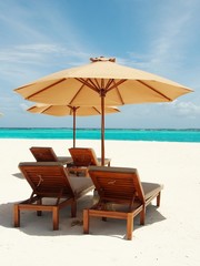 Relaxing in Sunny Beach of Maldives