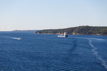 Freighter Heading up Coast of Canada in Blue Water