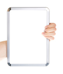 Hand writing on empty whiteboard isolated on white