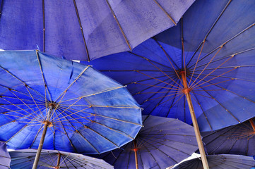 Overlap Blue Umbrella - obrazy, fototapety, plakaty