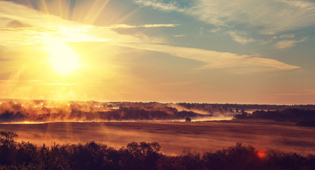 Fototapeta na wymiar sunrise with the mist
