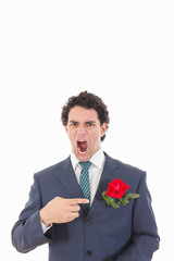 adult angry and shocked man in suit with disgust face expression