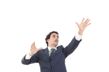 businessman with raised hands reaching for something with blank