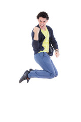 Excited successful man jumping of joy with proud expression