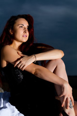 Fototapeta premium woman in a black dress