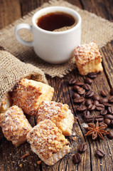 Sweet cookies of puff pastry and coffee