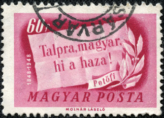 stamp printed by Hungary, shows slogan and olive branch