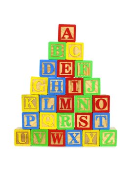 Stack of colorful toy wooden block letters