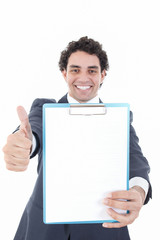 smiling business man  in suit holding up a banner or notes again